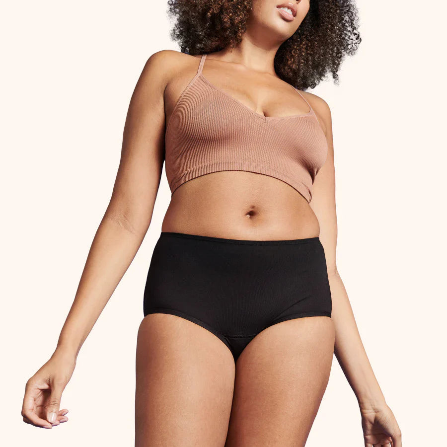 Soft Cotton Classic Washable Underwear Light Incontinence showcased on a model, highlighting its high-cut design and comfortable waistband, emphasizing functionality and eco-friendliness.