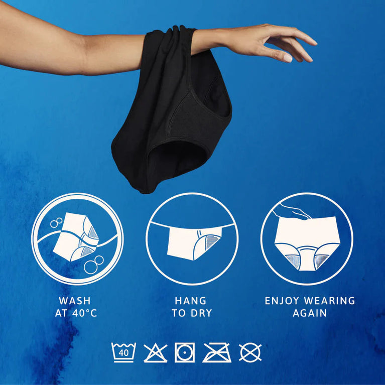 TENA Washable Soft Cotton Underwear | 3-Pack shown being held, demonstrating its soft, stretchy fabric designed for comfort and protection against light incontinence leaks.