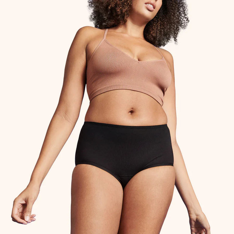 TENA Washable Soft Cotton Underwear | 3-Pack features soft, breathable high-cut design shown on a model, highlighting comfort and coverage for light incontinence protection.